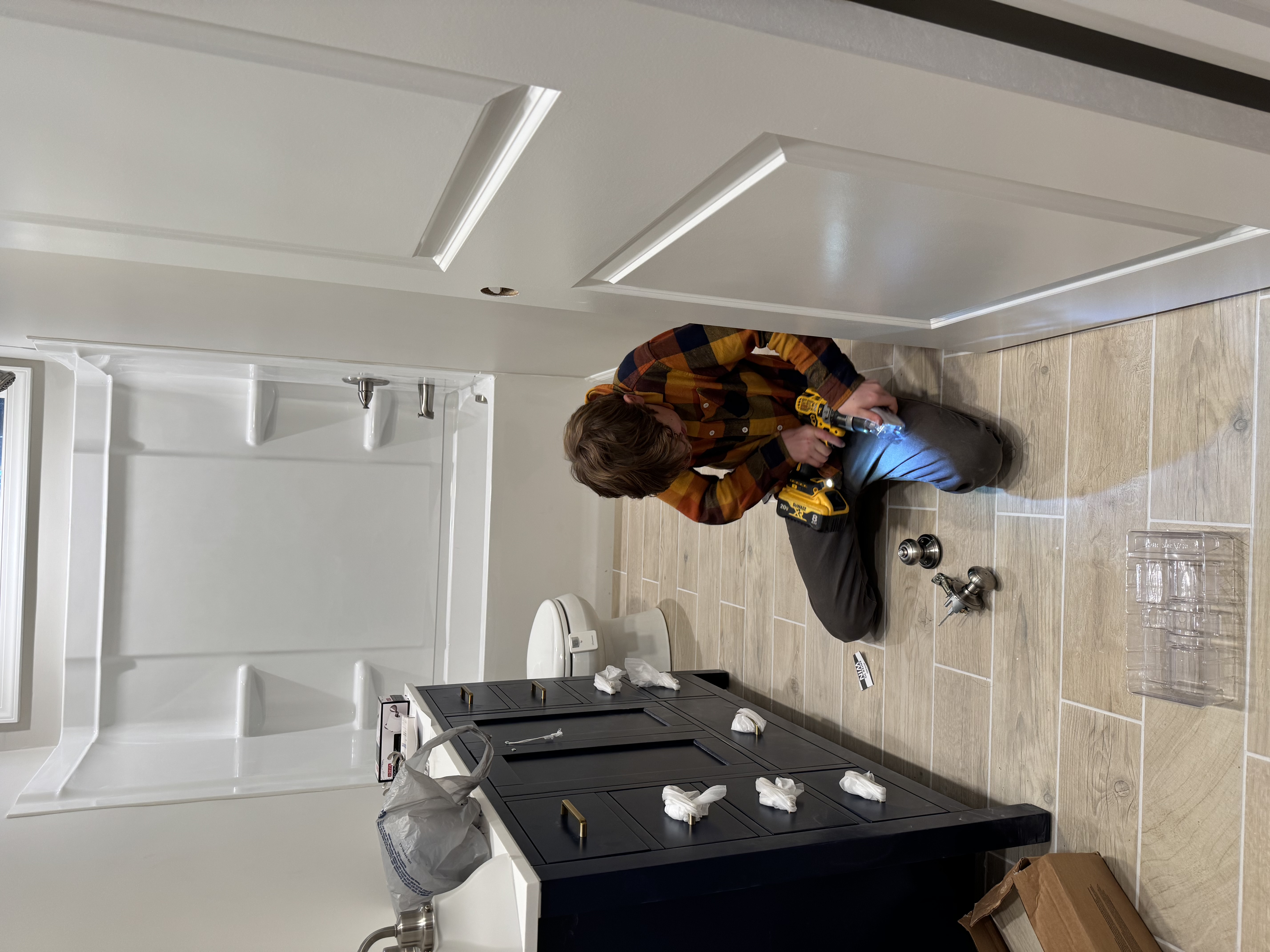 Finished attic bathroom with tile and modern fixtures