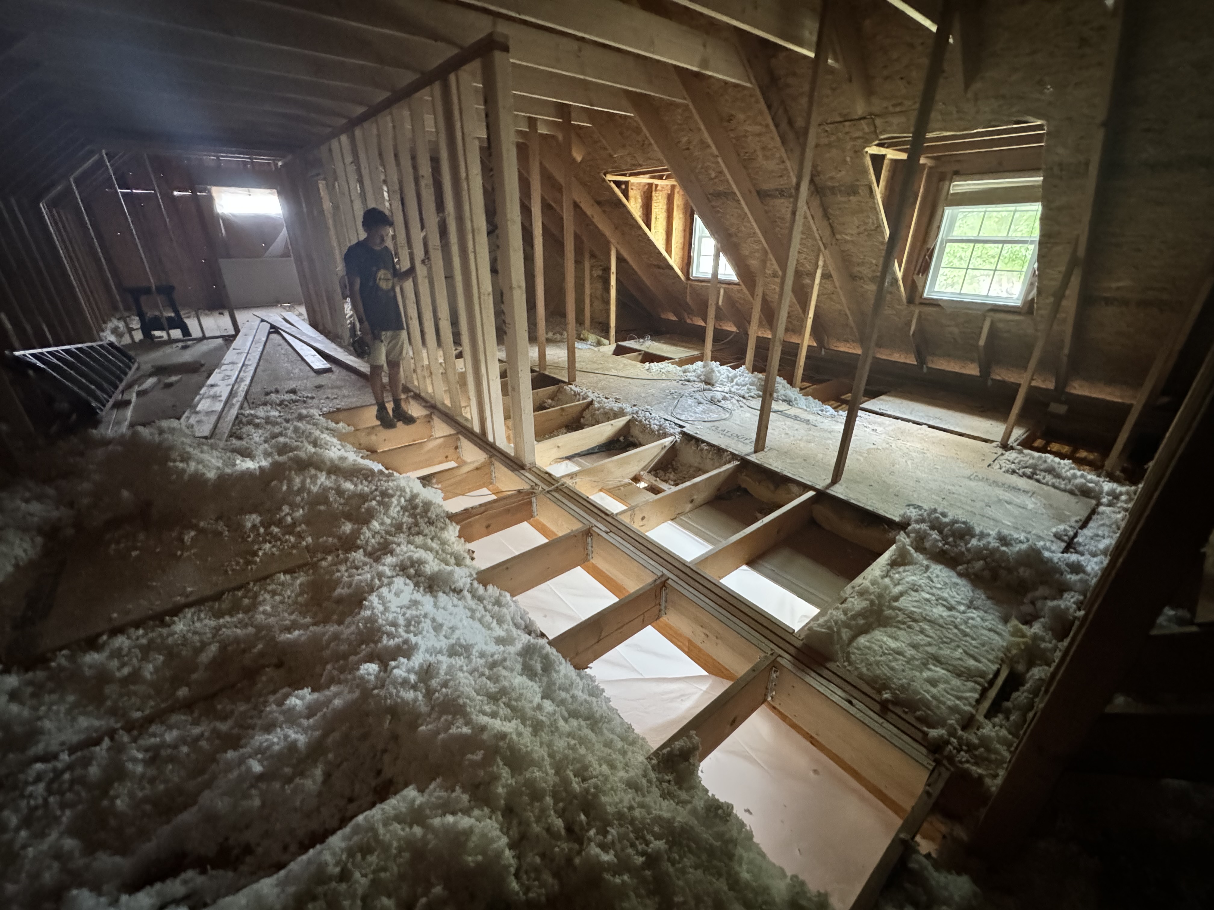 New knee walls and structural girder installation for floor load support